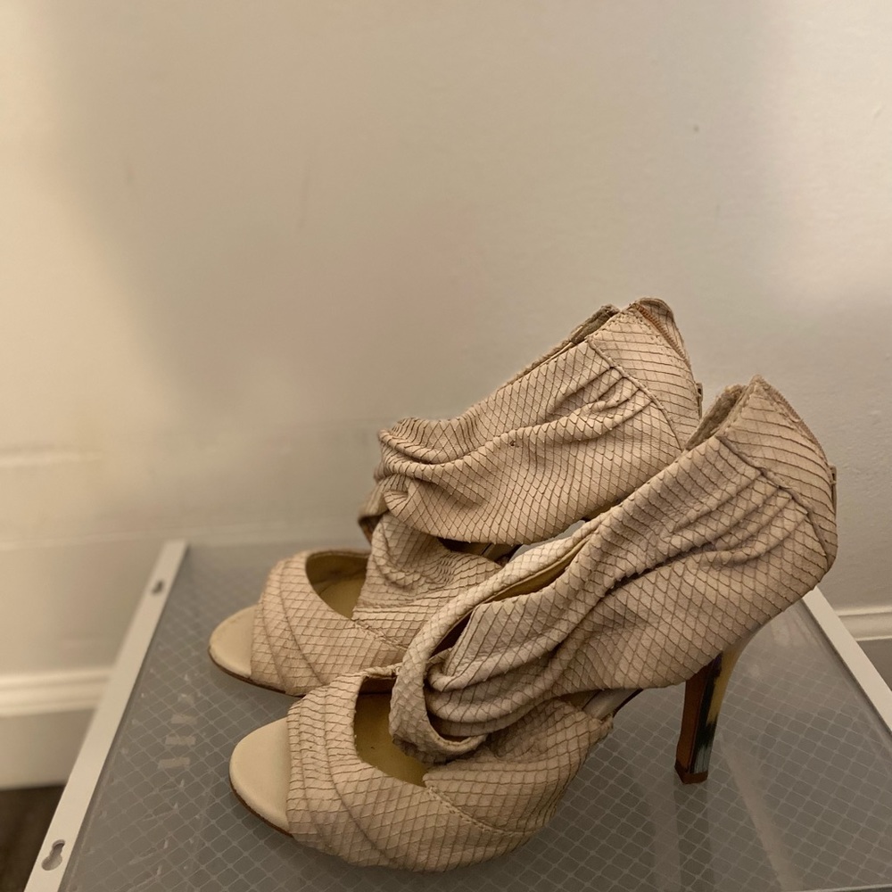 High heeled off white/cream  Isola shoes.